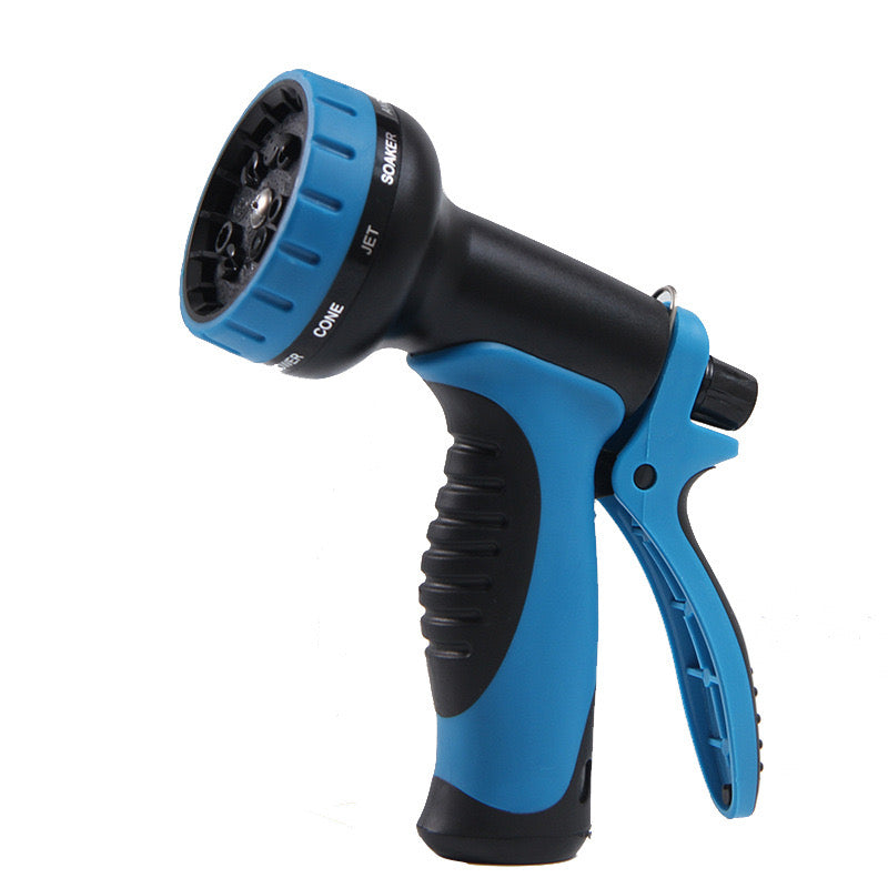 Blue and black garden hose nozzle on a white background